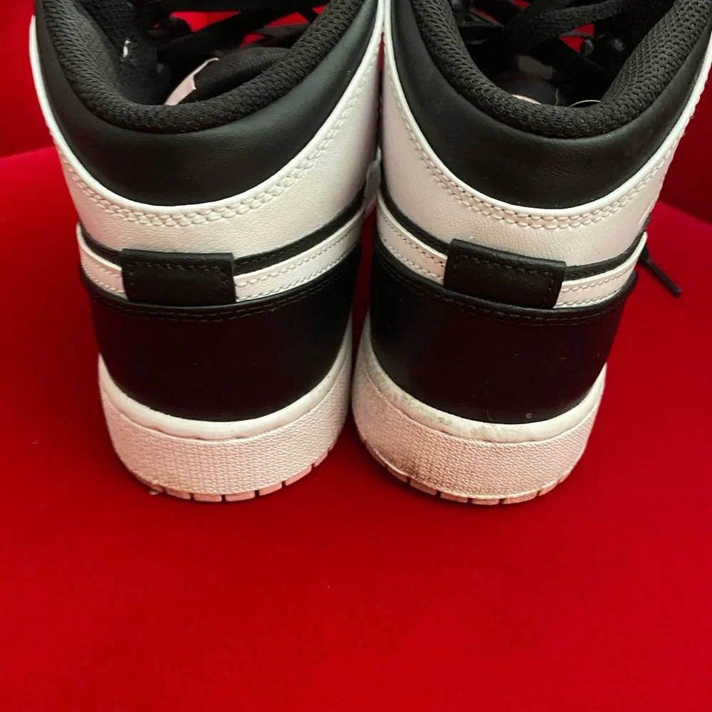Nike Women’s Black and White High-Top Sneakers